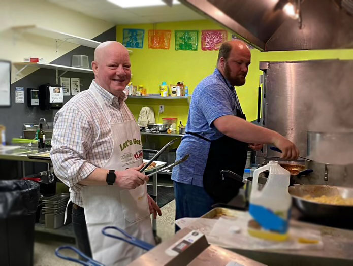 Dale Depew and Jordan preparing lunch in the Tiffin Community Kitchen